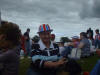 Spectators of all ages take a rest in the field at Bessbrook.