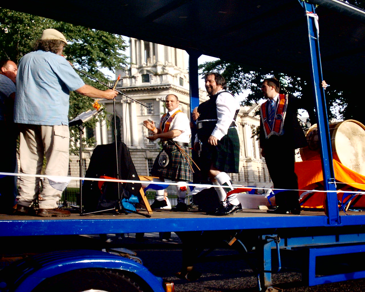 Ulster-Scots float passes Belfast City Hall on return from the field.